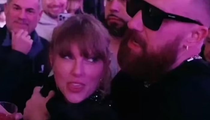 Screenshot of a TikTok video showcasing  Travis Kelce and Taylor Swift celebrating the Kansas City Chiefs Super Bowl triumph in Las Vegas.